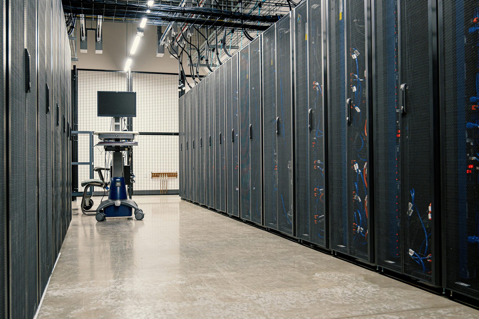 Server cabinets in data center aisle