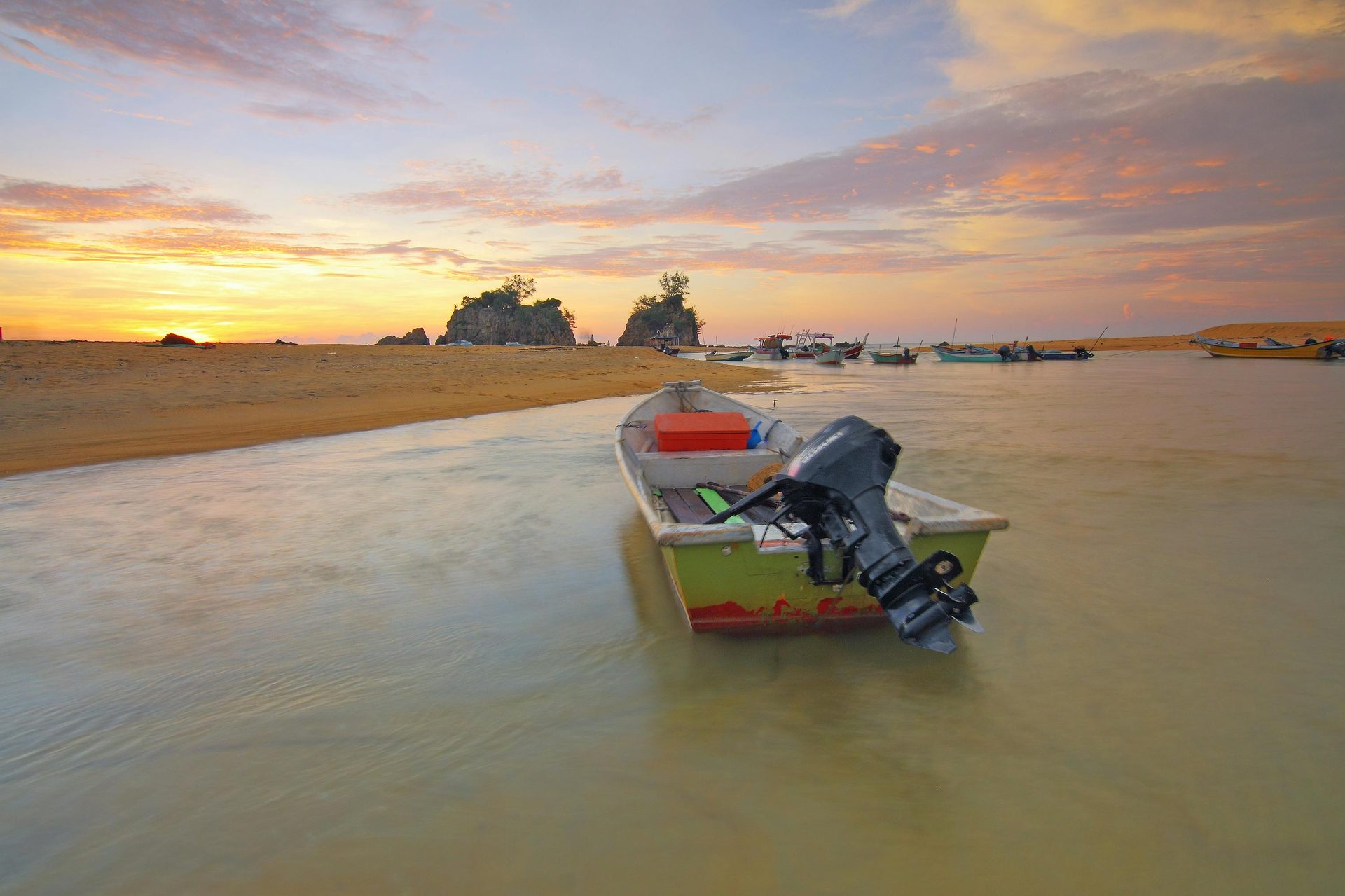 Boat at coastal sunset